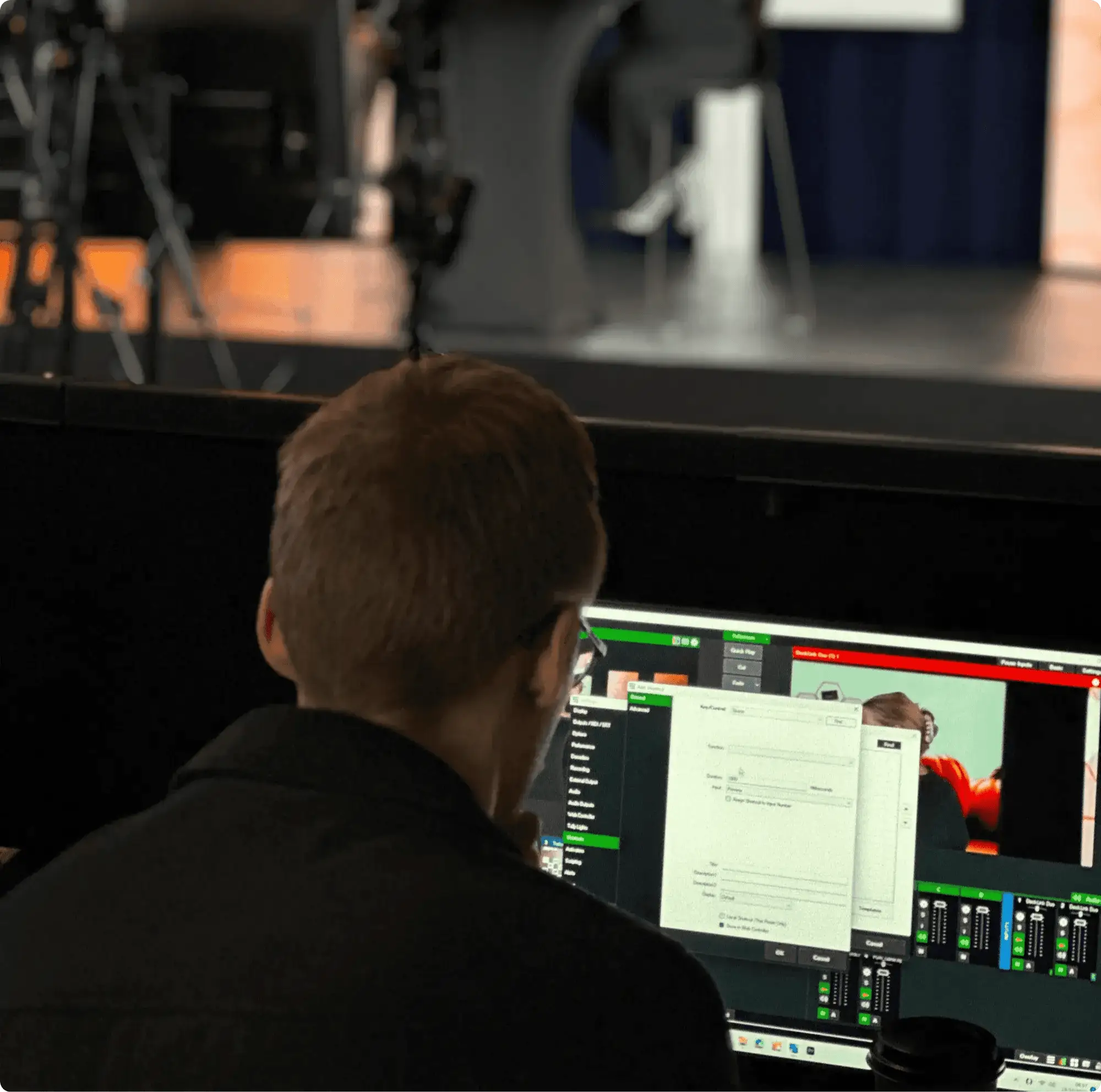 man focusing on program settings